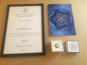 Order of service, Certificate and Badge.