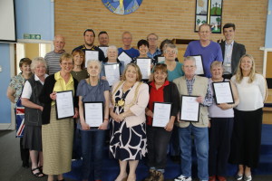 Group photo of Bramley War Memorial Committee Members and War & Remembered Graves volunteers after being  presented with copies of the Duke of York's Community Initiative Award by the Lord Mayor of Leeds, Councillor Jane Dowson along with Councillors Kevin Ritchie and Julie Heselwood on 9th May 2018 at Bramley Baptist Church.