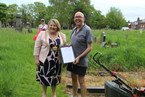 War and Remembered Graves volunteer Joe Morris is presented with a copy of the Duke of York's Community Initiative Award by the Lord Mayor of Leeds, Cllr Jane Dowson, May 9th 2018.